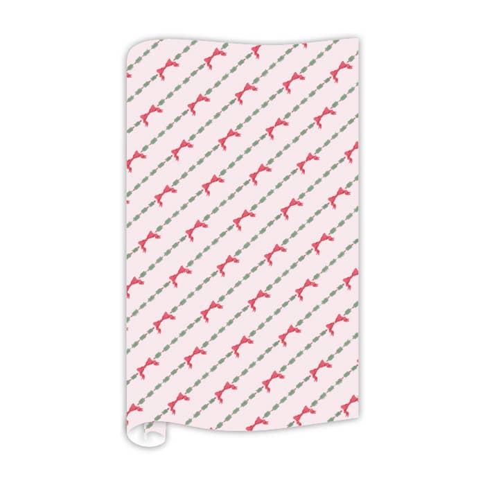 Holiday Green Garland Red Bows on Pink Wrapping Paper