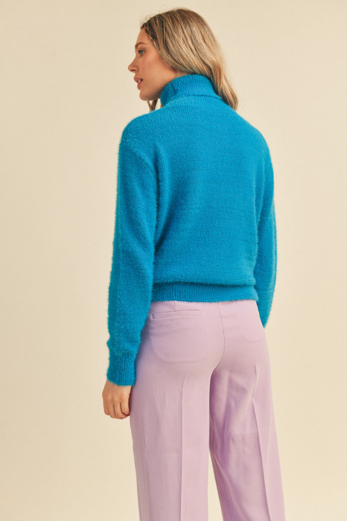 fuzzy turtleneck sweater