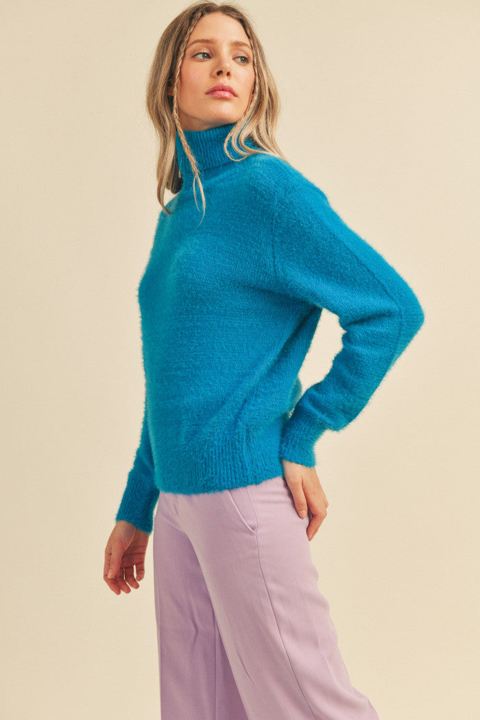 fuzzy turtleneck sweater
