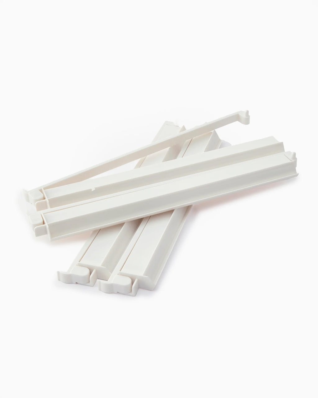 white acrylic rack and pusher set