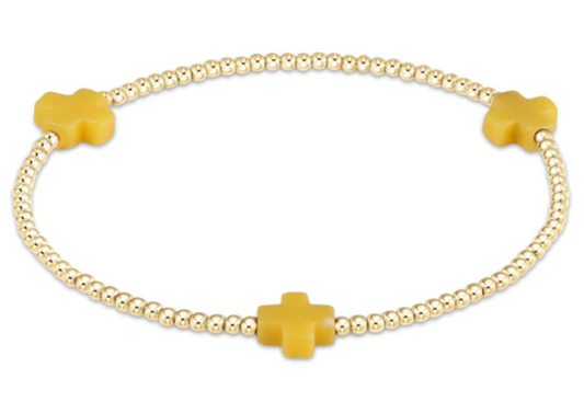 signature cross gold pattern 2mm bead bracelet canary