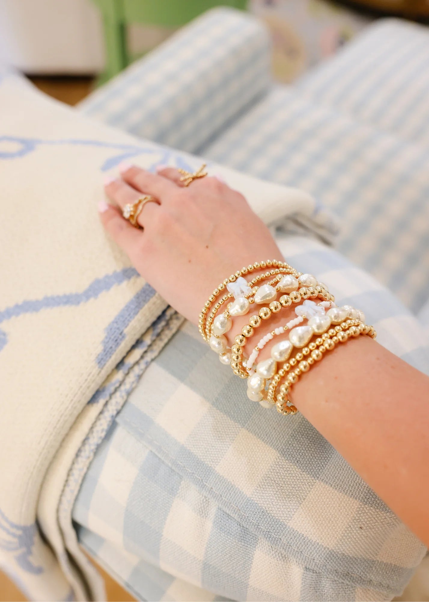 blue watercolor bow beaded bracelet on gold