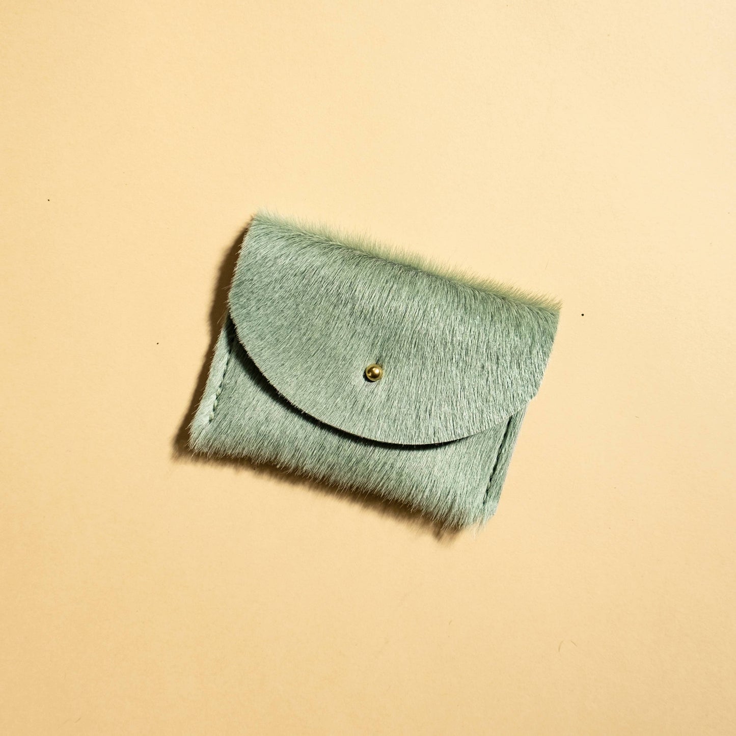 cardholder seafoam hair on hide